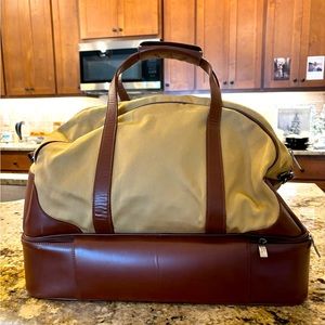 Classic Burberry golf bag. 18” long. Depth 11.5” Height 16”.   Leather & canvas